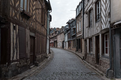 Narrow alley along buildings