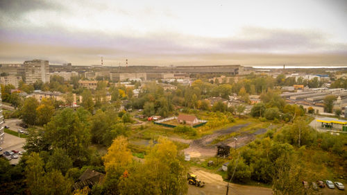 High angle view of buildings in city against sky