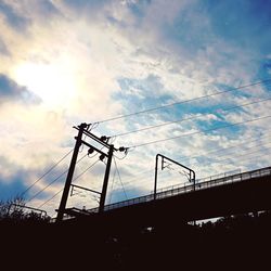 Low angle view of silhouette birds against sky