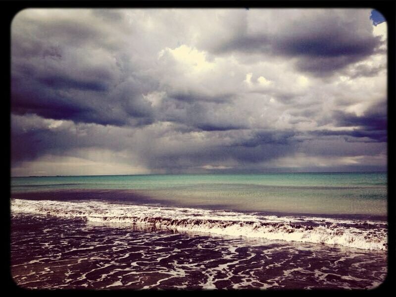 sky, transfer print, cloud - sky, cloudy, scenics, tranquil scene, sea, water, beauty in nature, tranquility, auto post production filter, weather, nature, horizon over water, beach, cloud, overcast, shore, idyllic, storm cloud