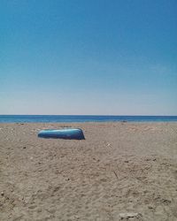 Scenic view of sea against blue sky