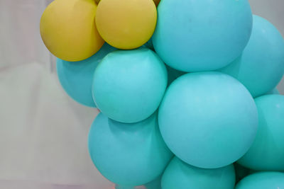 High angle view of multi colored balloons on table