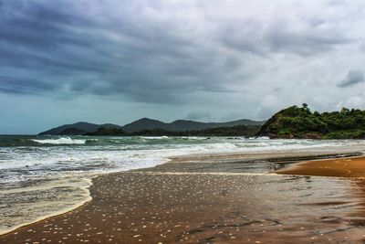 Scenic view of beach against sky