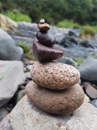 Close-up of stone stack on rock