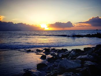 Scenic view of sea against sky during sunset