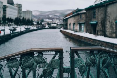 View of river in city during winter