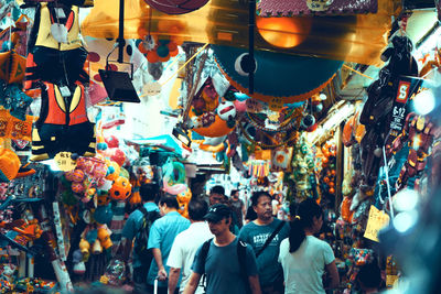 People at market stall in city