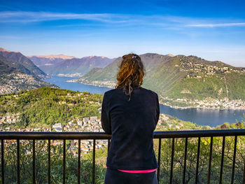 Woman admiring the landscape of lake como