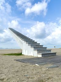 Low angle view of staircase against sky