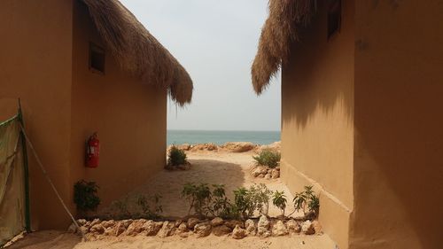 Panoramic view of beach against clear sky