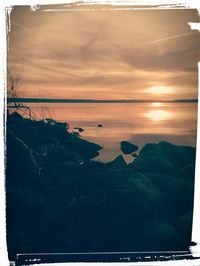 Scenic view of sea at sunset