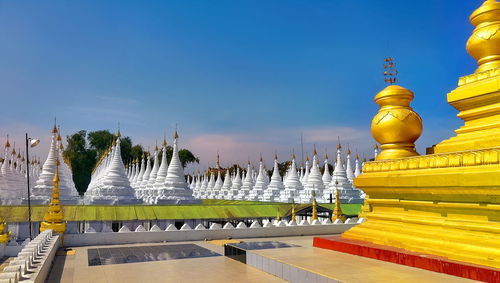 View of temple building against blue sky