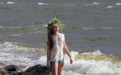 Woman standing at beach