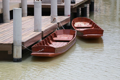 Boat moored in lake