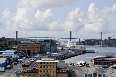 High angle view of bridge and buildings against sky