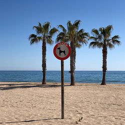 Road sign at beach