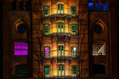 Illuminated building in city at night