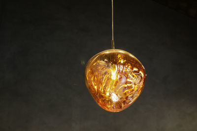 Close-up of illuminated light bulb