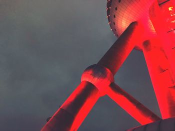 Low angle view of illuminated lamp against sky