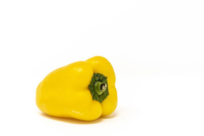 Close-up of yellow bell pepper against white background