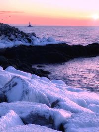 Scenic view of sea against sky during sunset