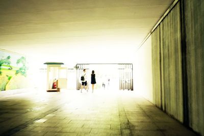 People walking in corridor