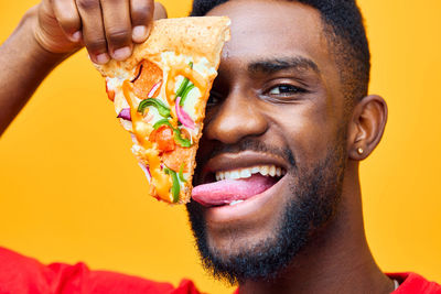 Close-up of man holding food