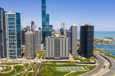 Modern buildings in city against sky