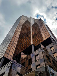 Low angle view of modern building against sky