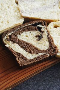 High angle view of bread on cutting board