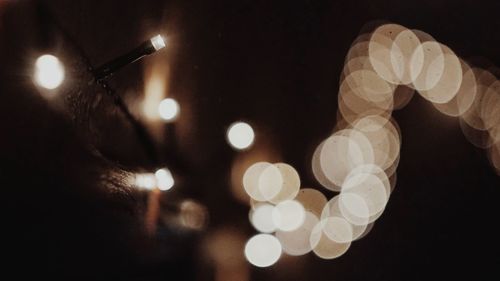 Close-up of illuminated lighting equipment