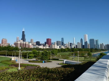 Panoramic view of modern buildings against clear sky