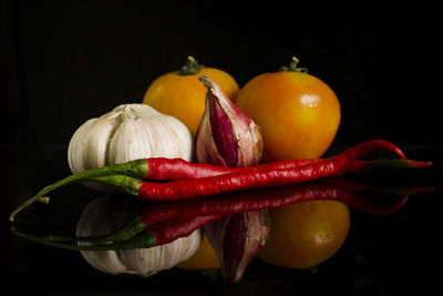 Close-up of vegetables against black background