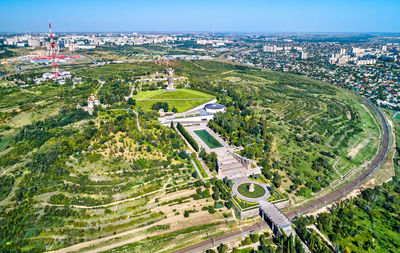 High angle view of buildings in city against sky