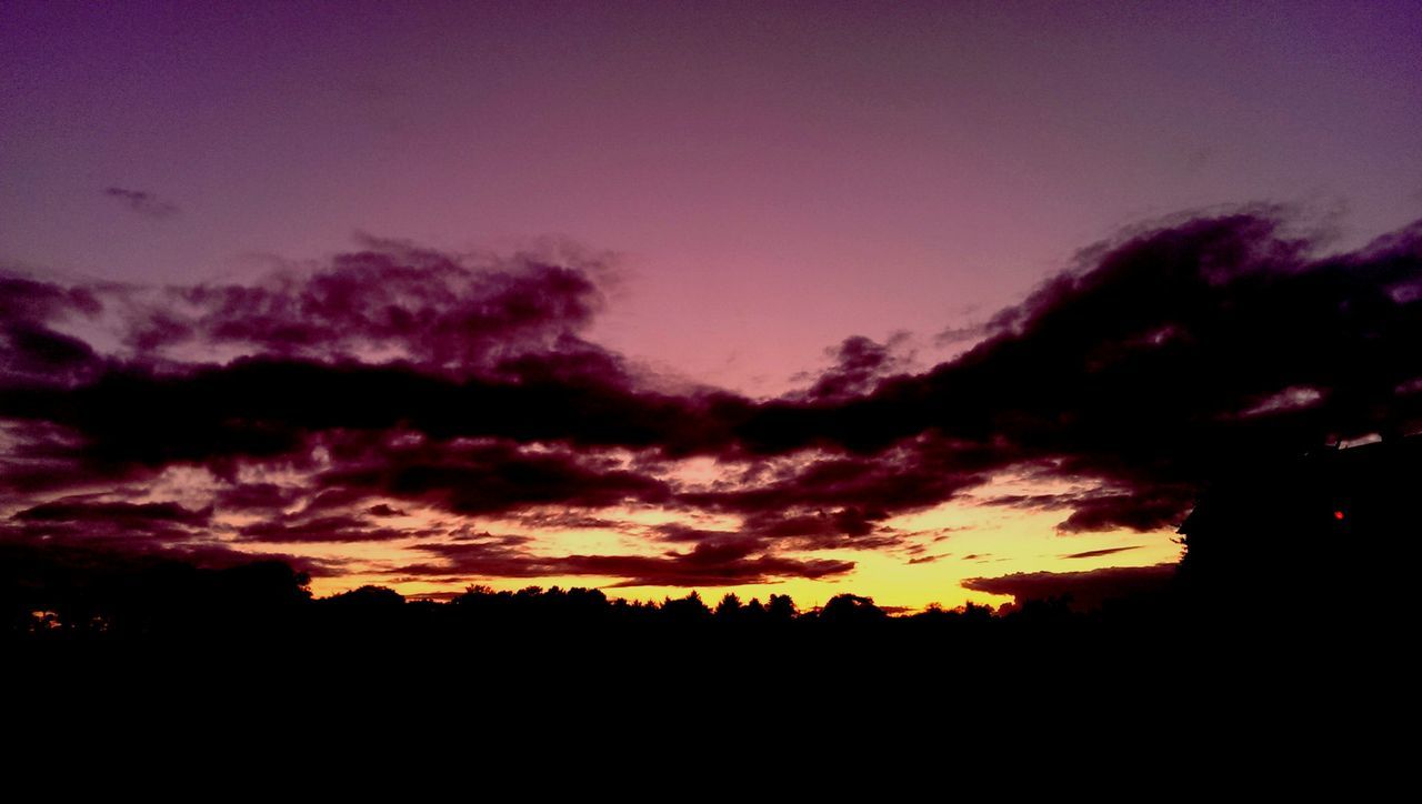 silhouette, sunset, sky, scenics, beauty in nature, tranquil scene, tranquility, nature, cloud - sky, idyllic, dramatic sky, orange color, dark, low angle view, landscape, cloud, majestic, outdoors, dusk, no people