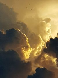 Low angle view of clouds in sky during sunset