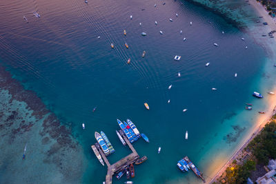 Passenger parking shipping in high season on phi phi island kra bi thailand aerial top view 