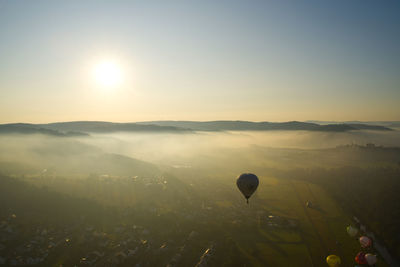 Hot air balloon against sky during sunset