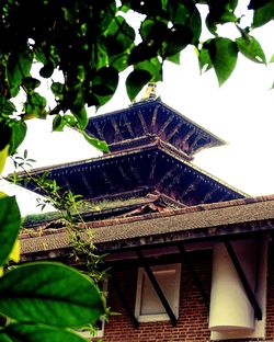 Low angle view of traditional building against sky
