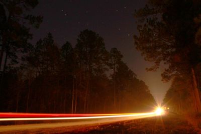 Light trails on road at night