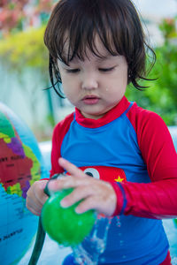 Boy playing with water