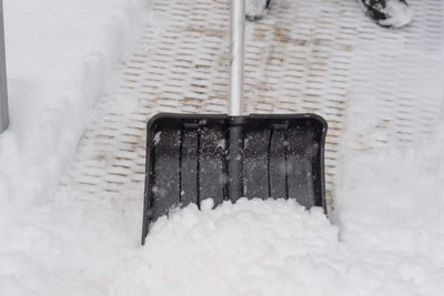 High angle view of snow covered stone wall
