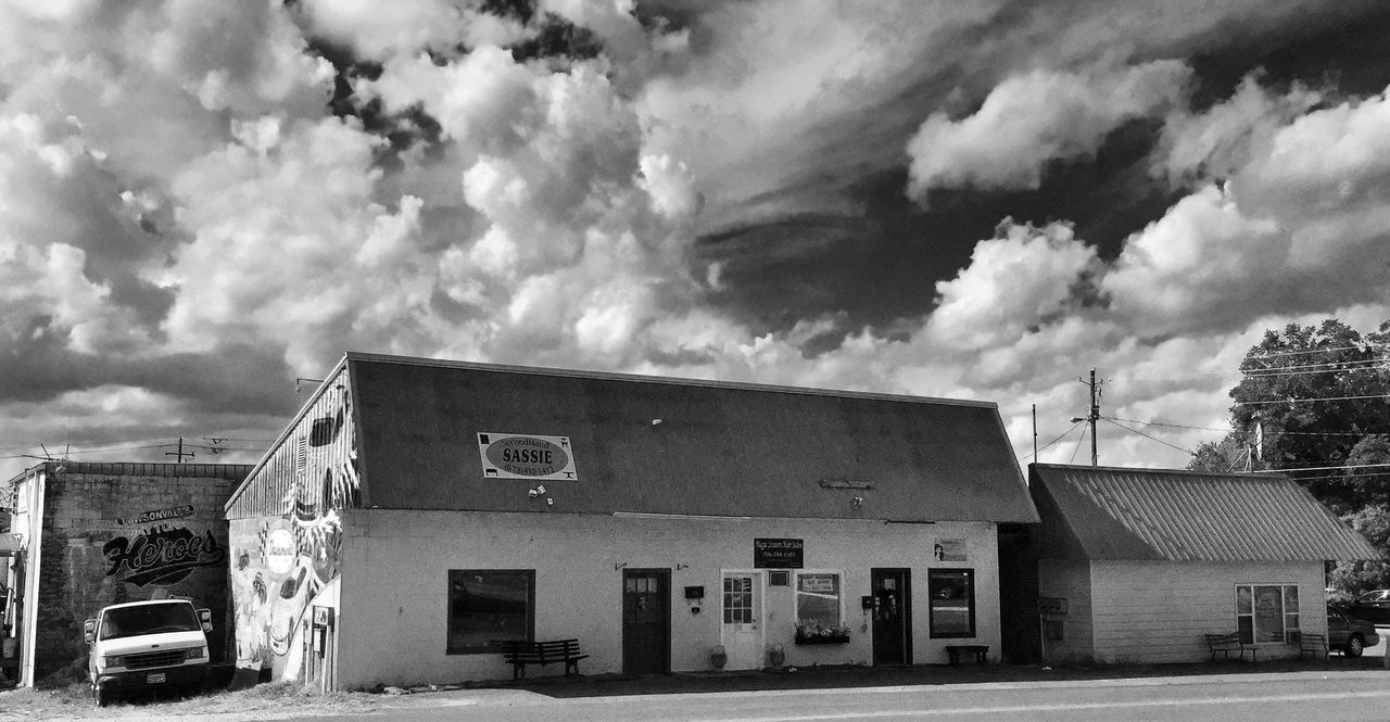 building exterior, architecture, built structure, sky, cloud - sky, cloudy, house, cloud, residential building, residential structure, weather, street, city, building, road, overcast, outdoors, day, low angle view, no people