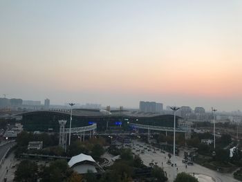 High angle view of buildings against sky during sunset