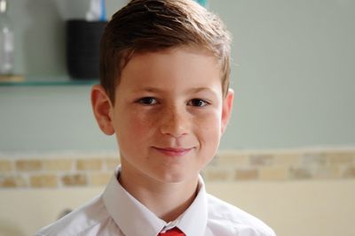 Close-up portrait of smiling boy