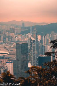 High angle view of buildings against sky during sunset