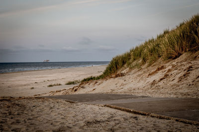 Scenic view of beach against sky