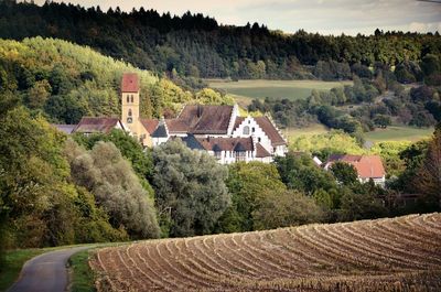 Scenic view of agricultural landscape against sky