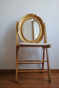 Close-up of chair on hardwood floor