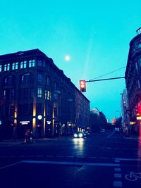 View of city street at dusk